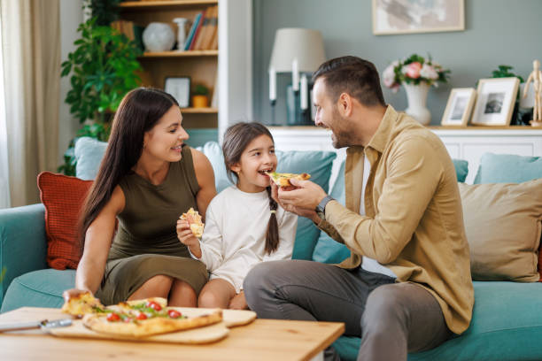 istock Family pizza dinner at home 2046558988