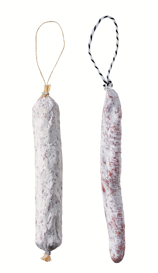 Spanish salami fuet sausage or dry sausage covered fermented mold isolated on a white background.