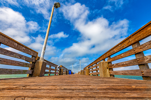 The public fishing pier at Seawolf Park located on Pelican Island, Galveston.