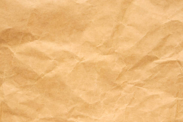 istock Abstract crumpled and creased recycle brown paper texture background 2046624298