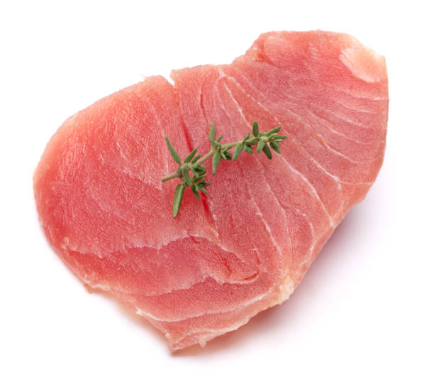 istock Fresh tuna Fish steak isolated on a white background 2046627544