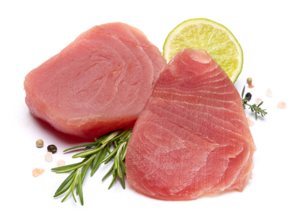 istock Fresh tuna Fish steak isolated on a white background 2046627550