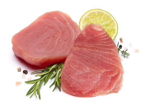 Fresh tuna Fish steak isolated on a white background.