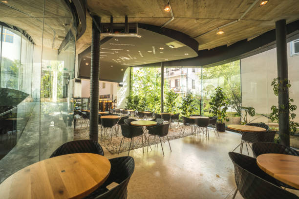 istock Urban Restaurant With Big Plants and Glass Wall 2046649495