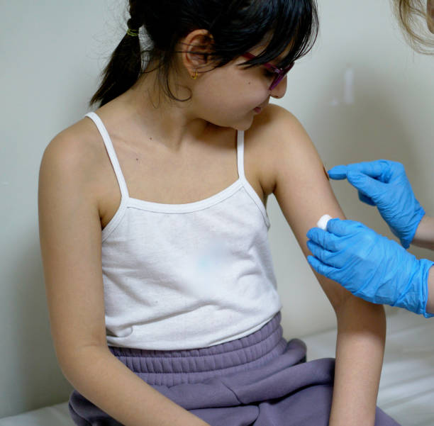 istock little girl getting tetanus shot 2046654339