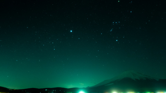 Snow-covered Mt. Fuji and Orion's Starry Night