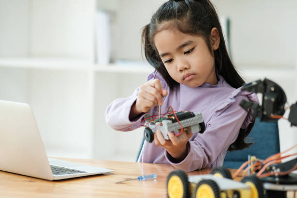 istock STEM education concept. Asian young girl learning robot design. 2046727646