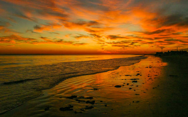 Red sunset over Brighton Beach, New York, USA.