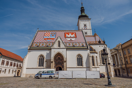 St. Mark's Church in Zagreb, Croatia is famous for its tile roof displaying the coat of arms of Zagreb and the Triune kingdom.