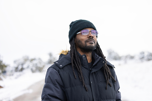 An African American man with winter background.