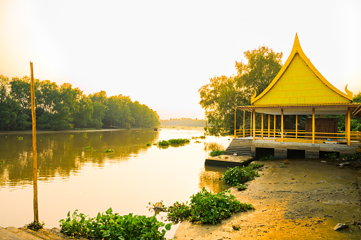 Evening scenery along the Bang Pakong River at Jo Lo Temple Pavilion, Chachoengsao Province
