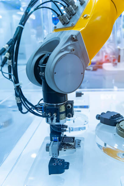 istock automatic gripping and smart robot working on smart factory,industry 4.0 and technology. 2046824410