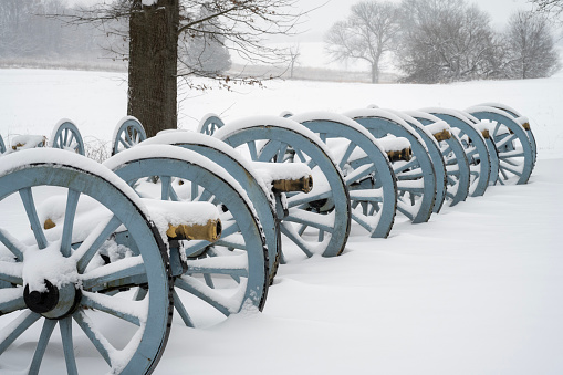 Cannons covered with snow at Artillery Park in Valley Forge National Historic Park, King of Prussia, Pennsylvania, USA