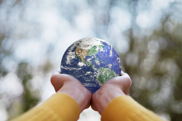 istock ESG , Environmental, Social and Governance concept. A globe in human hands showing support and protection. Elements of this image furnished by NASA. ESG , Environmental, Social and Governance concept. A globe in human hands showing support and protection. 2046854870