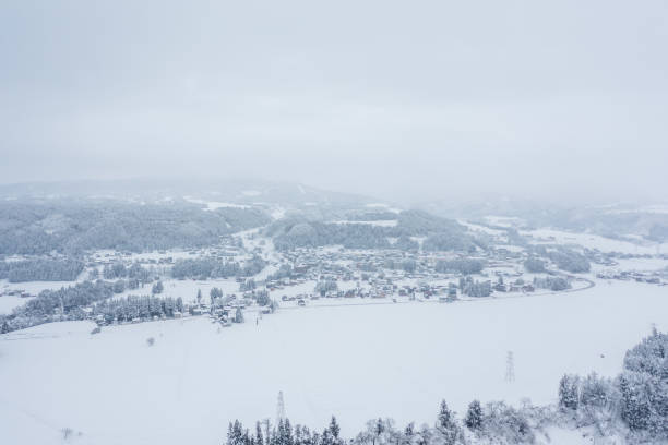 istock Drone photo: Snowy mountains covered in pure white snow 2046873609