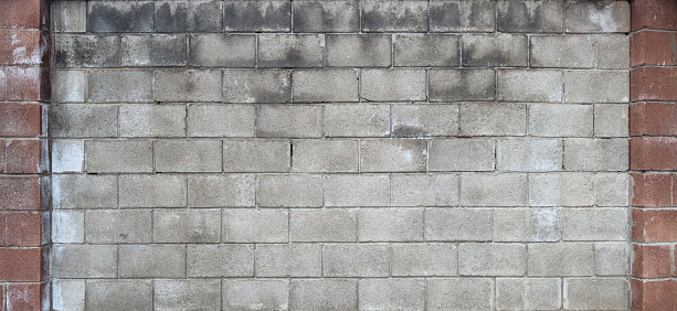 Wall texture with geometry with red brick, brick wall with red frame brick archway