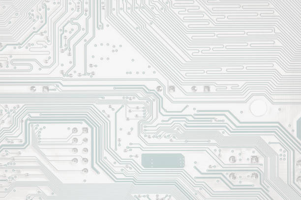 istock electrical connections of red computer mother board. details closeup. technology background. 2047036743