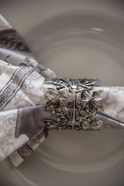 Table setting for a dinner or lunch with contemporary and elegant plates and decorations.