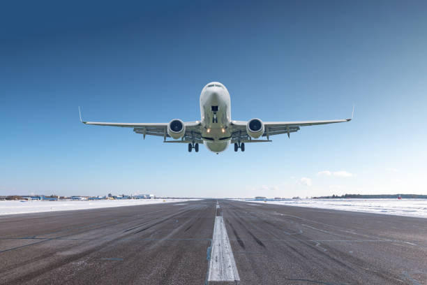 istock White passenger airliner take off airport runway at winter 2047081586