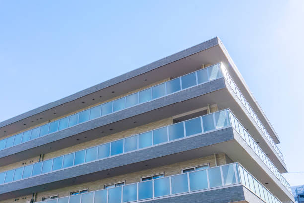 istock Apartment exterior and blue sky 2047143515