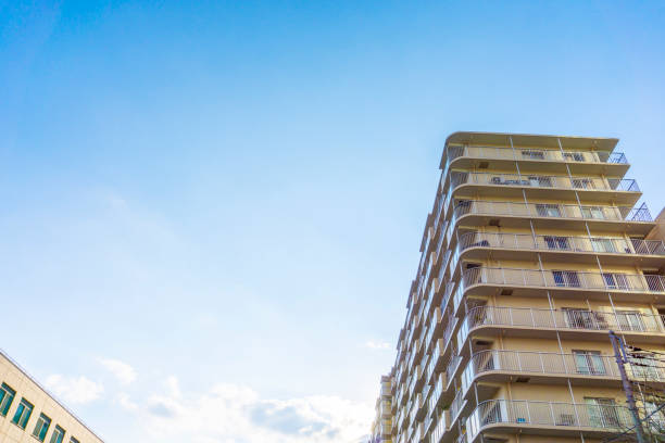 istock Apartment exterior and blue sky 2047146582