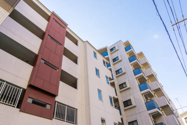 istock Apartment exterior and blue sky 2047146590