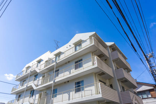 istock Apartment exterior and blue sky 2047148122