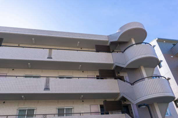 istock Apartment exterior and blue sky 2047148123