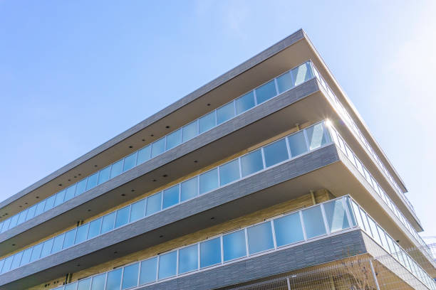 istock Apartment exterior and blue sky 2047149152