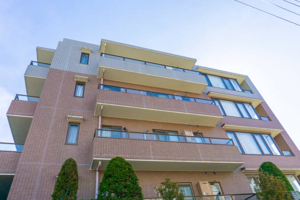 istock Apartment exterior and blue sky 2047153836