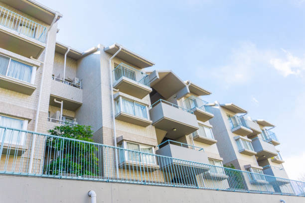 istock Apartment exterior and blue sky 2047154871