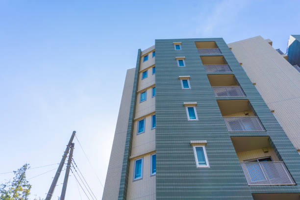 istock Apartment exterior and blue sky 2047156444