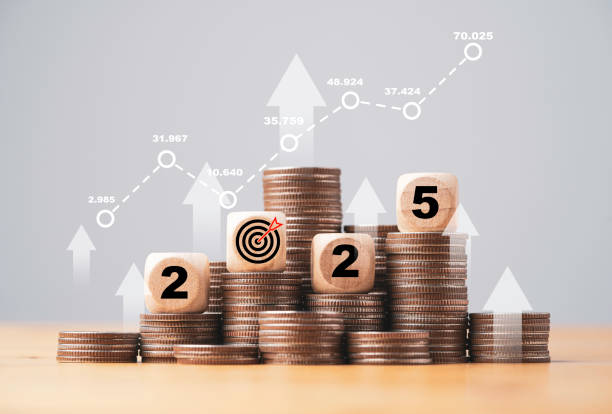 istock 2025 on coins stacking with increasing graph and up arrow  for business budget planing and investment growth of new year concept. 2047168375