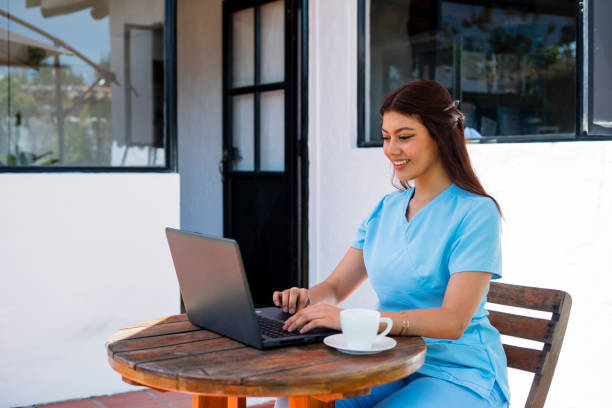 istock Doctor is teleworking from home on her laptop 2047224008