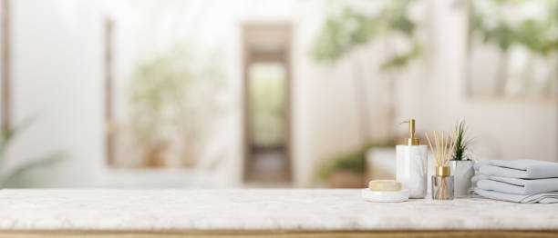 istock A presentation space on a white marble tabletop features toiletries in a luxurious bathroom. 2047303285