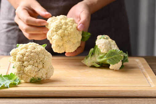 Organic cauliflower with hand prepare for cooking