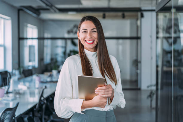 istock Confident businesswoman in modern office. 2047432582