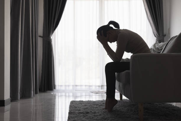 istock Silhouette of a sad woman in violent problems. Mental problems. Life problems. Dark domestic violence. Stress. Violence. Depression and suicide concept. 2047438871