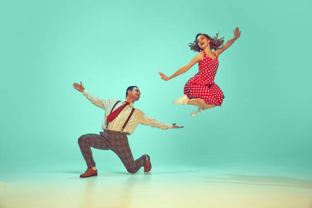 A conceptual image of a woman floating in space toward a bright light.