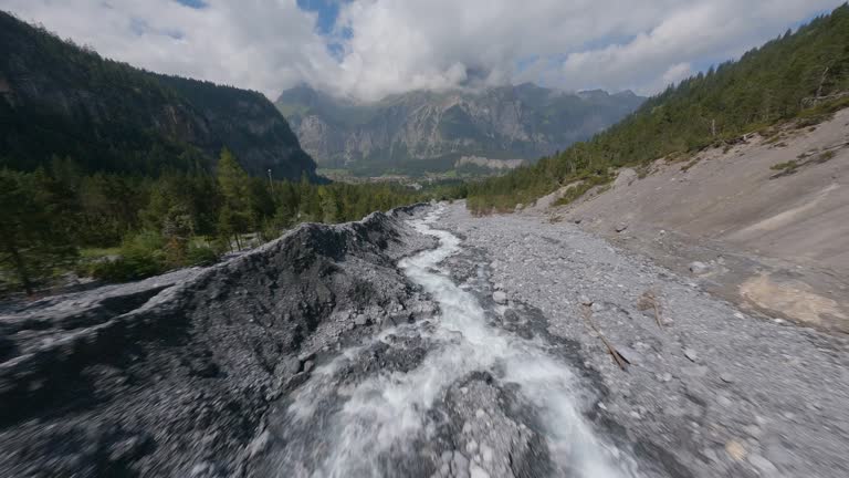 First person view FPV drone flying over the Alps.