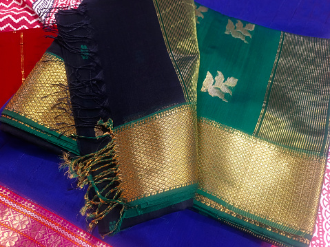 Hand Weaving Silk & Handloom Sarees, saree with golden details, woman wear on festival, ceremony and weddings, expensive sarees are famous for their gold and silver zari, brocade. Incredible India.