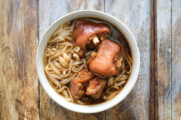 istock savory Chinese noodle, cooked with soy sauce braised trotter 2047504329