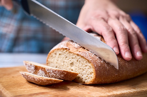 slicing wholegrain bread