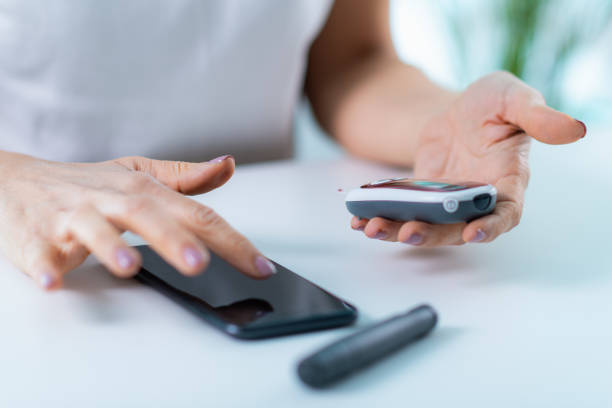 istock Blood sugar testing with a portable glucometer, ensuring quick and accurate results for diabetes management 2047511790