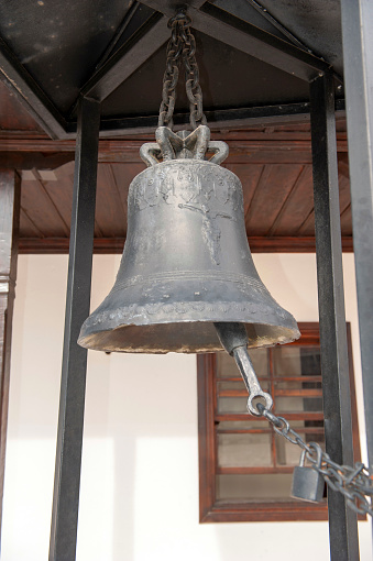 One old and big church bell isolated on white background (with clipping path)