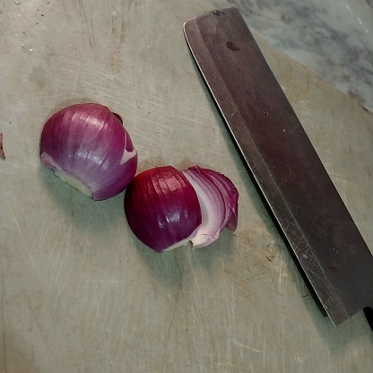 Fresh chopped onion and the chopping knife
