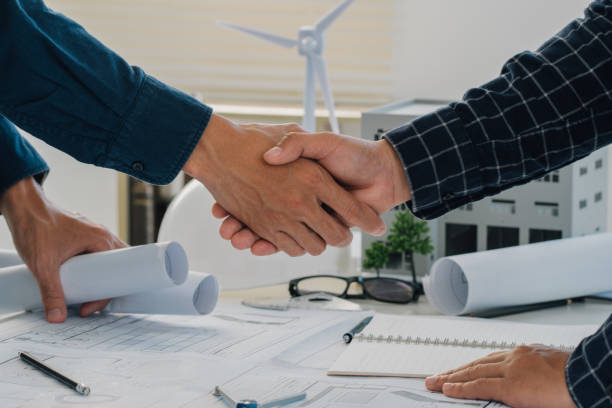 istock Team of engineer and architects working join hands to build successful projects.Teamwork and partnership concept. Empathy and Social connection.Professional colleagues 2047555596