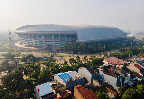 Aerial view of Gelora Bandung Lautan Api (GBLA) Stadium in the morning, the biggest football stadium in West Java, Indonesia, located in Bandung City.