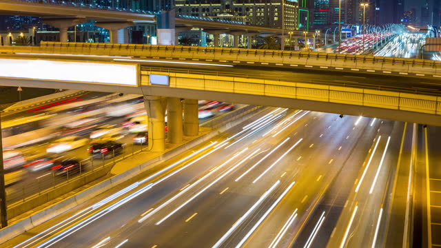 dubai city night light famous traffic sheikh zayed road bridge panorama 4k timelapse uae