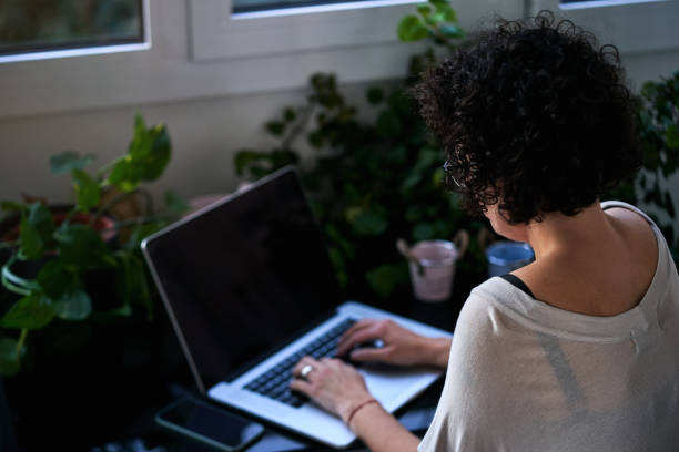 istock A woman working in her green home office. 2047579158
